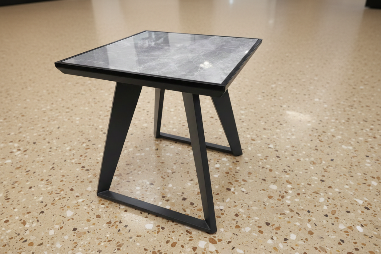 Marble-effect grey glass top surface detail showing premium finish