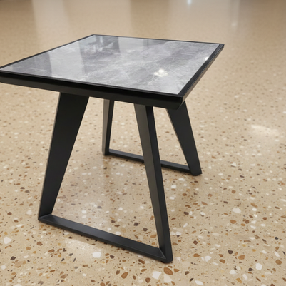 Marble-effect grey glass top surface detail showing premium finish